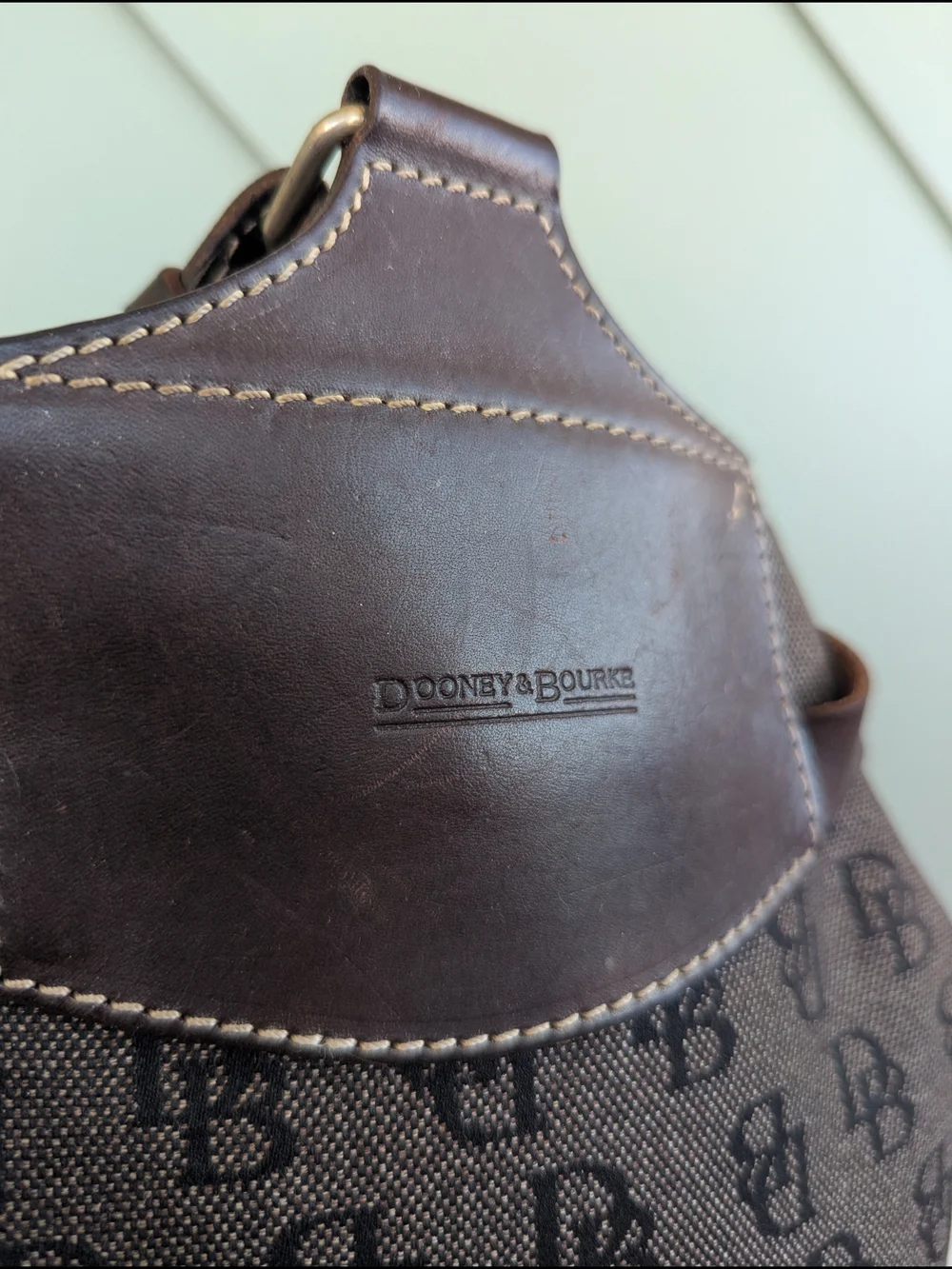 Dooney & Bourke Brown/Black Monogram Sling Backpack